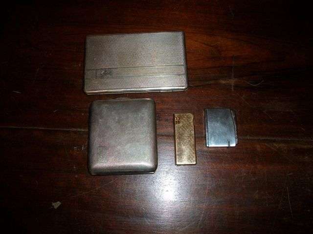 Smokers cigarette cases and gas lighters job lot